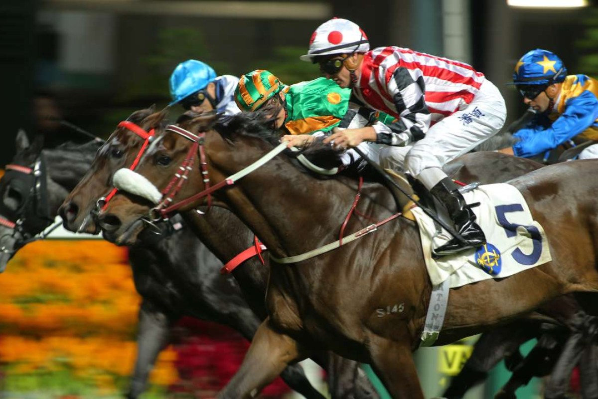 Harbour Master storms over the top of his rivals in the Group Three January Cup after a gem of a ride from Zac Purton. Photos: Kenneth Chan