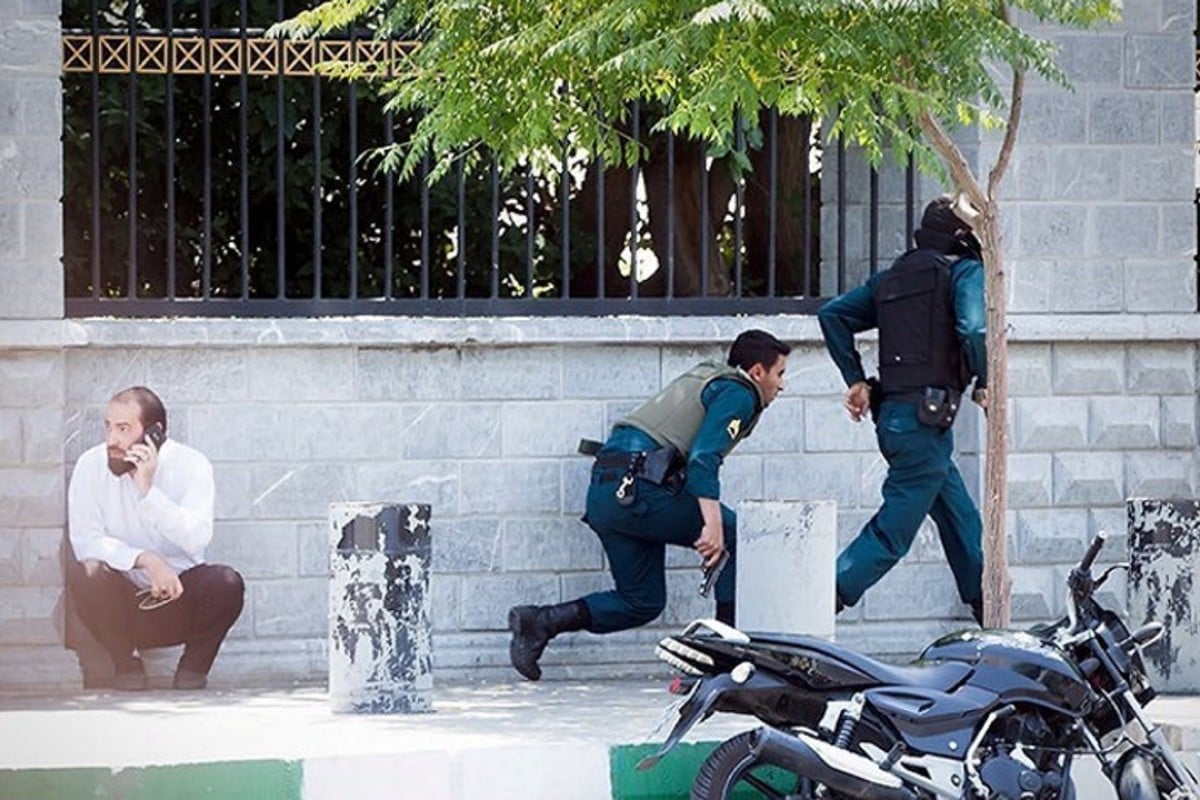 Iranian forces react to the attack on the Iranian parliament. Photo: Reuters