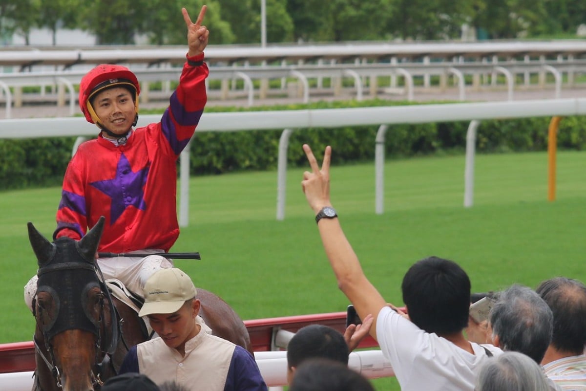 Matthew Poon celebrates with the crowd at Sha Tin after winning on Victory Boys. Photos: Kenneth Chan