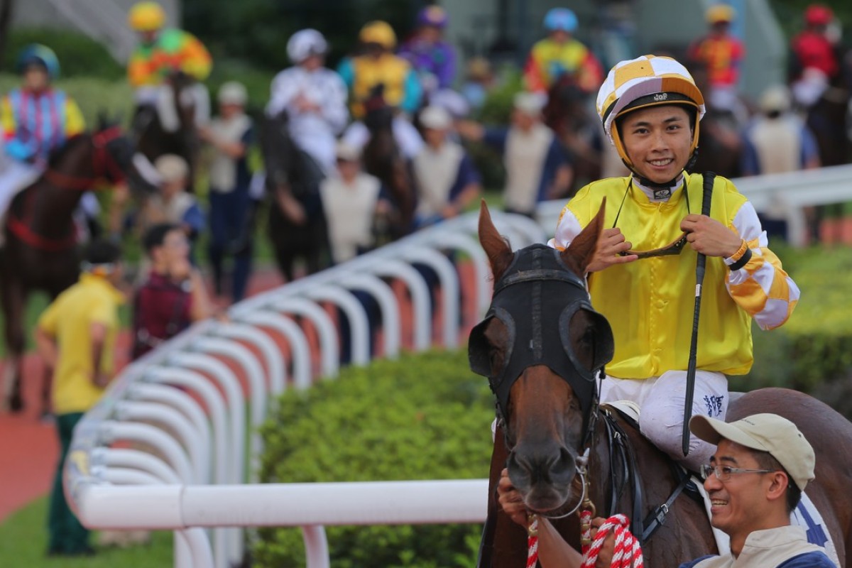 Matthew Poon is all smiles after winning aboard Penang Hall. Photos: Kenneth Chan