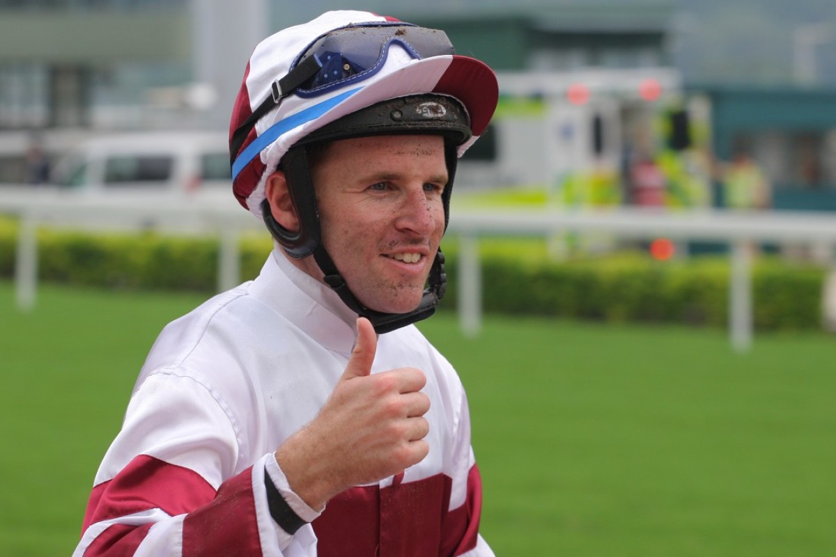Tommy Berry celebrates his first winner of the season on Sunday after Hair Trigger scored in Class Three. Photos: Kenneth Chan.