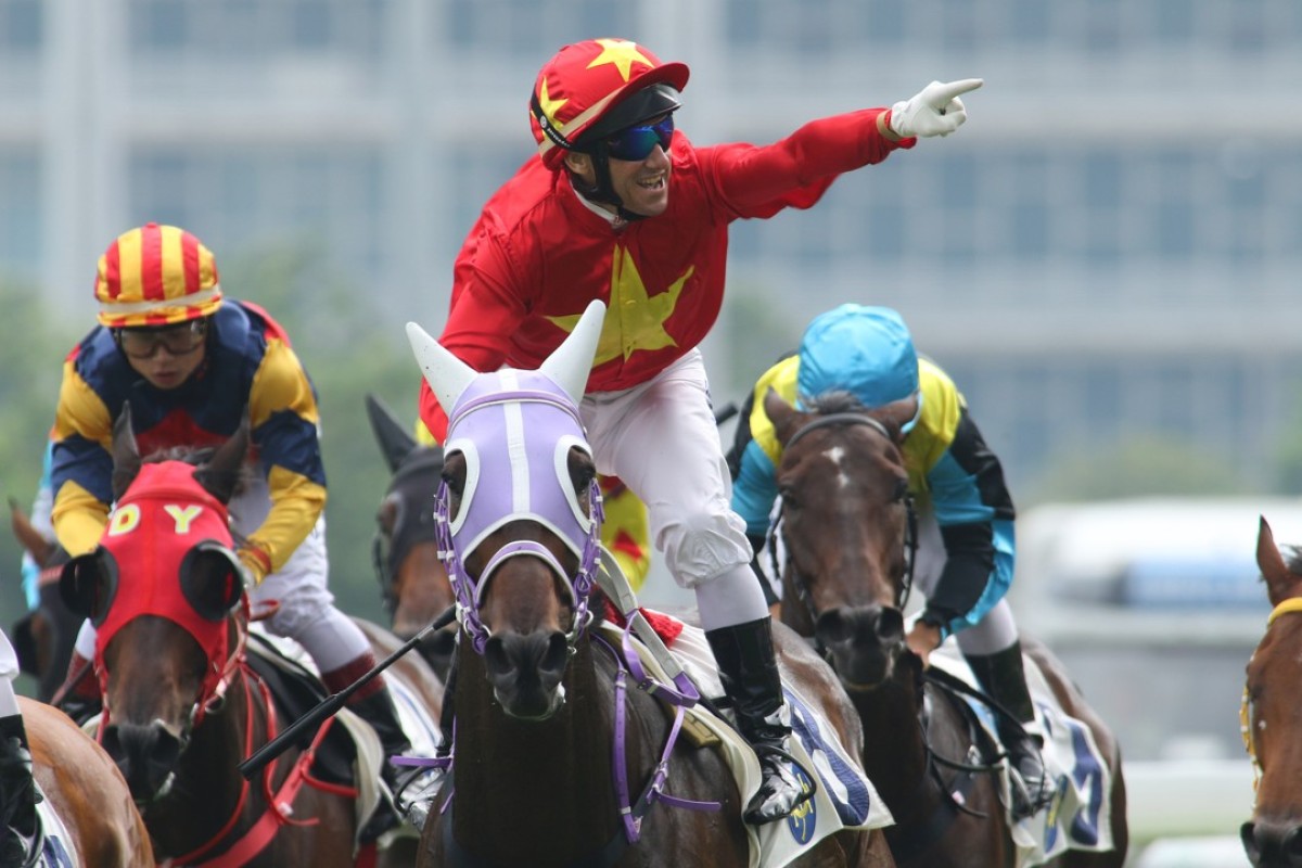 Brett Prebble salutes as King Winsa prevails at Sha Tin on Saturday. Photos: Kenneth Chan