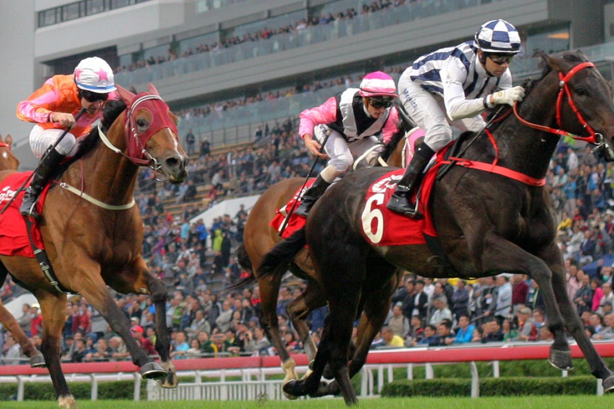 Joao Moreira pushes out Seasons Bloom to take out the Group Two Jockey Club Mile in November. Photos: Kenneth Chan