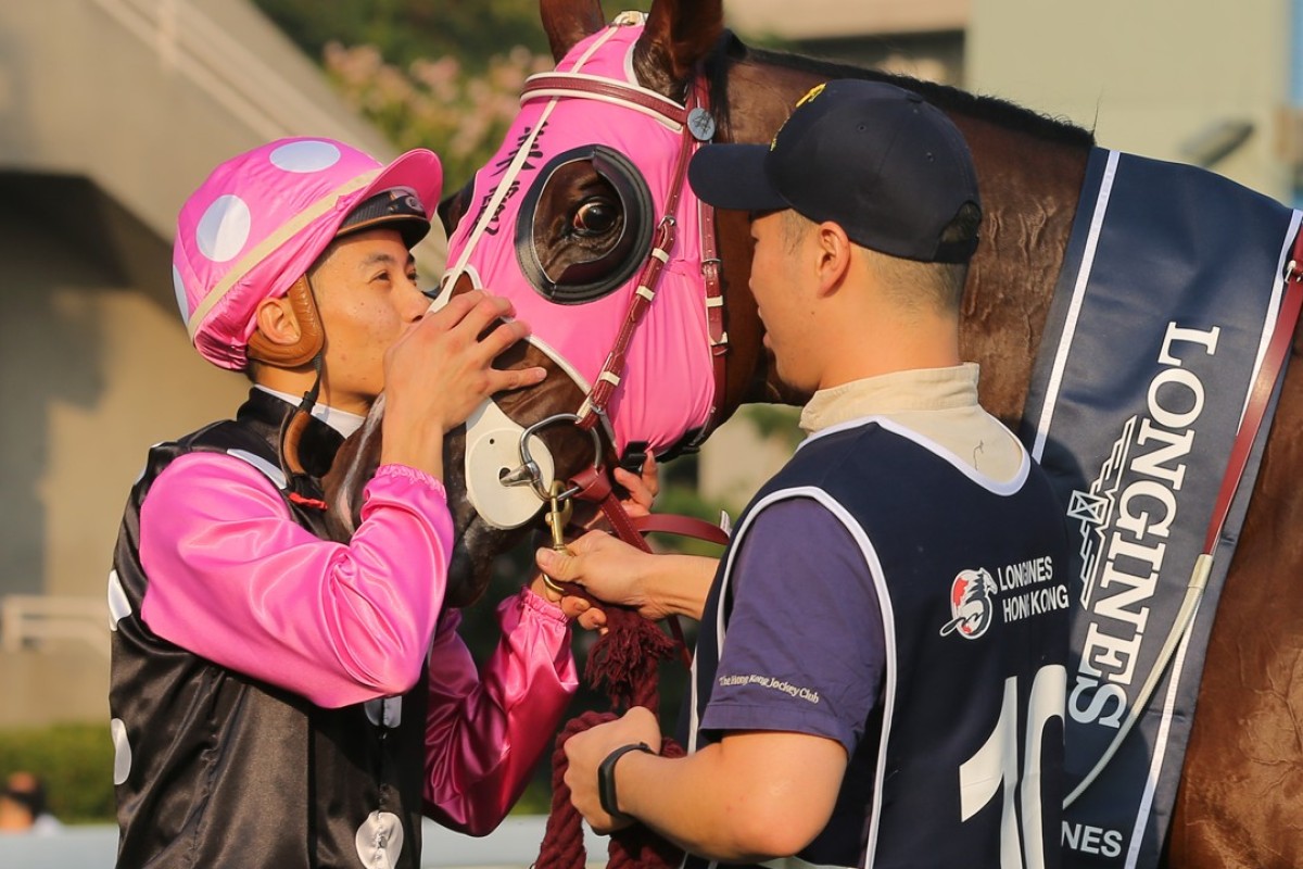 Derek Leung kisses Beauty Generation after winning the Hong Kong Mile. Photos: Kenneth Chan