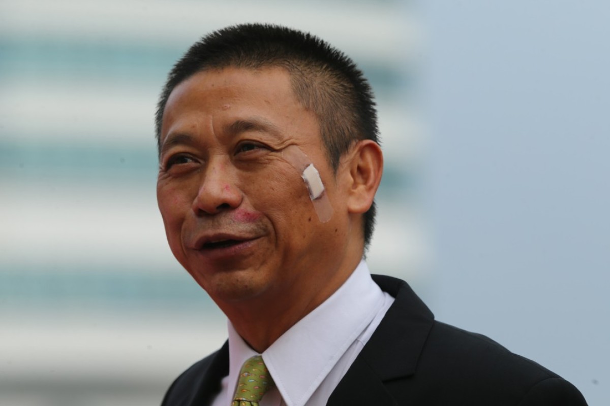 A battered Danny Shum manages to celebrate a winner at Sha Tin on Sunday after being run over by a horse on Thursday. Photos: Kenneth Chan