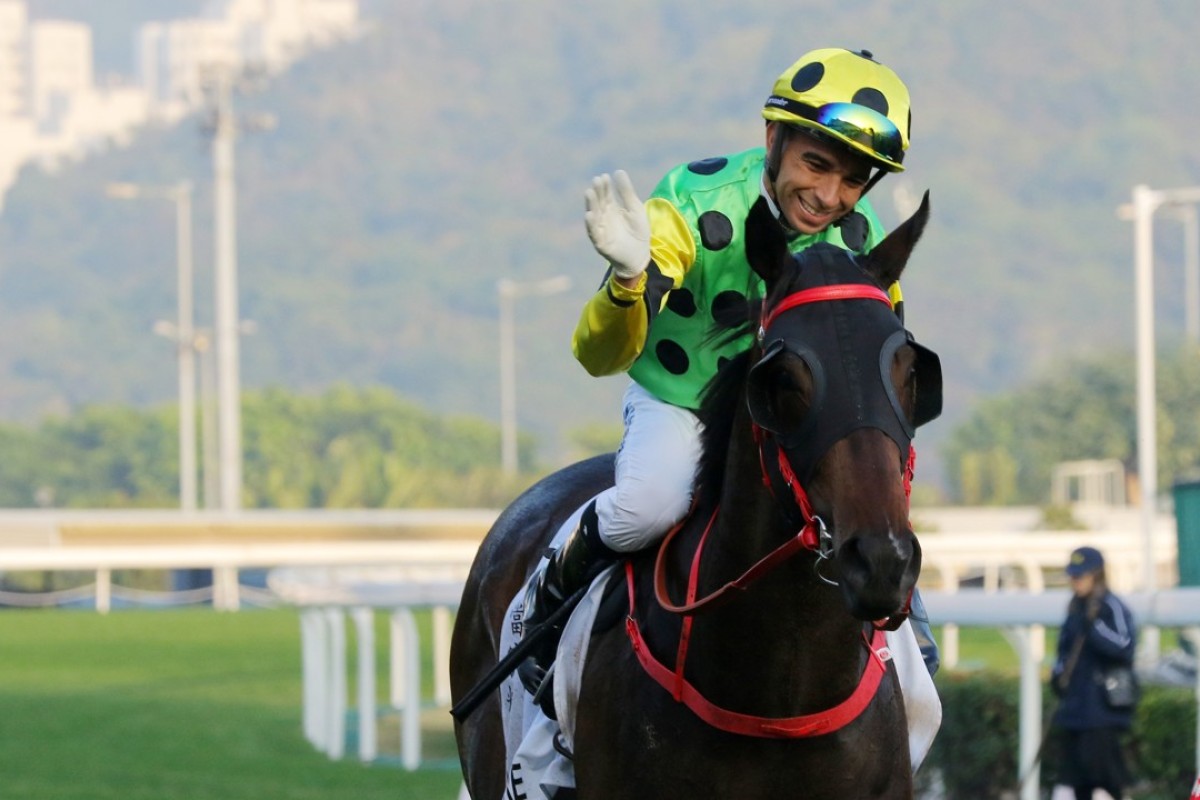 A delighted Joao Moreira gives Nothingilikemore a pat. Photos: Kenneth Chan