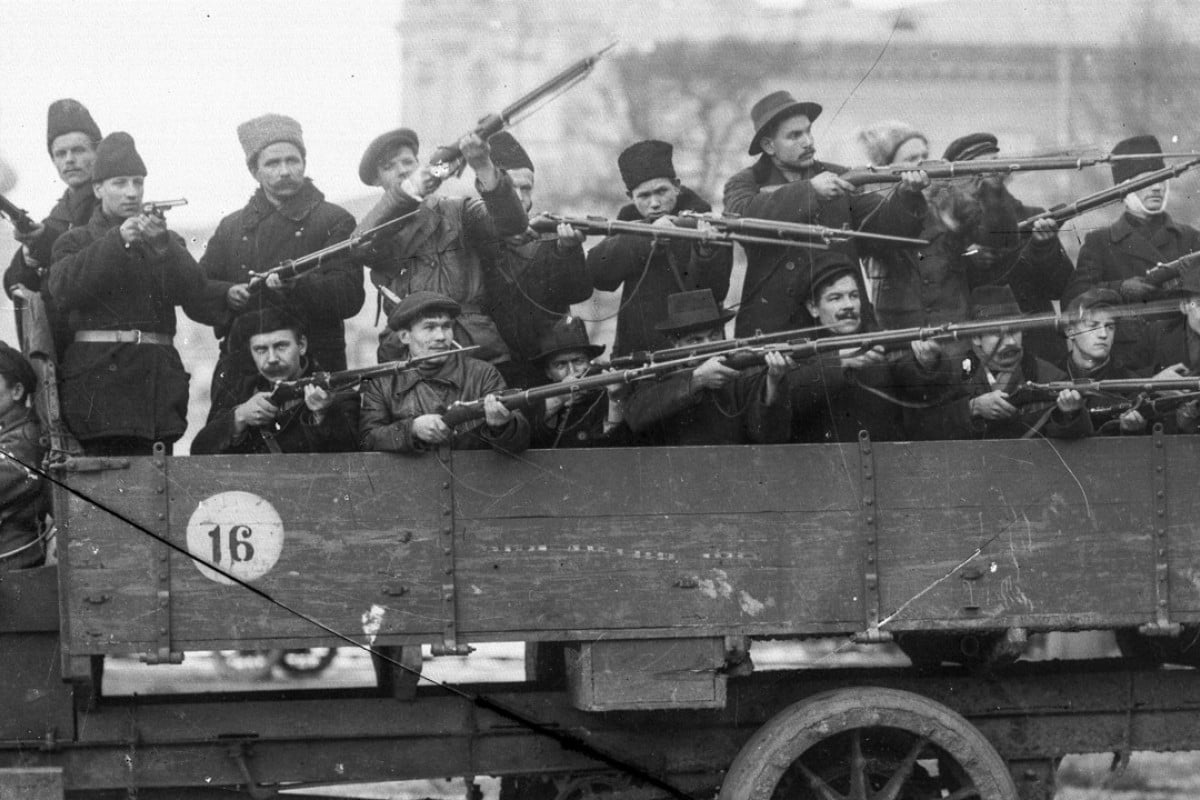 Members of the Red Guards at the Smolny Institute building, in St Petersburg, which was chosen by Vladimir Lenin as Bolshevik headquarters during the October revolution in 1917. Picture: AP