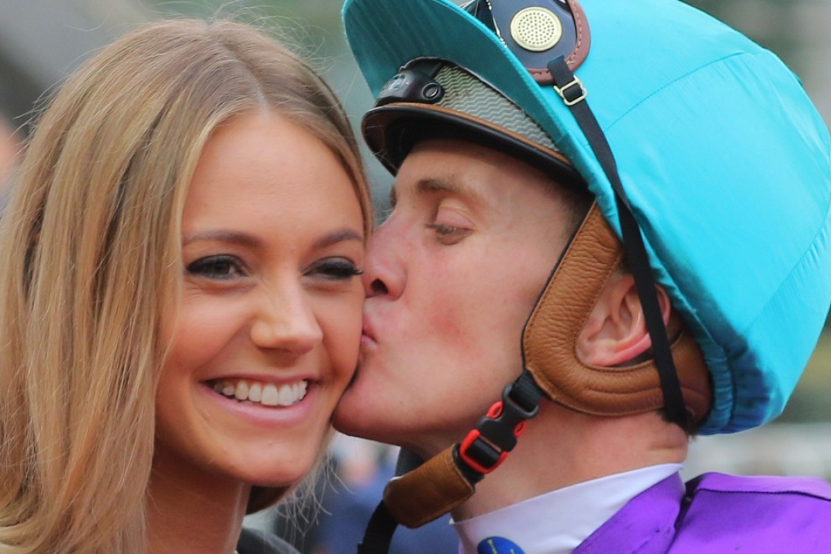 Chad Schofield plants a kiss on the cheek of his girlfriend Hannah after winning the Classic Cup. Photos: Kenneth Chan