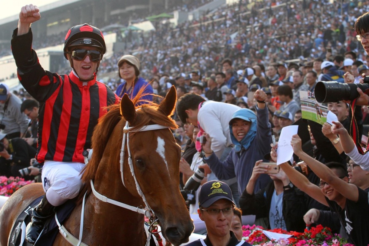 Zac Purton punches the air after winning the 2017 Group One Hong Kong Cup on Time Warp. Photos: Kenneth Chan.