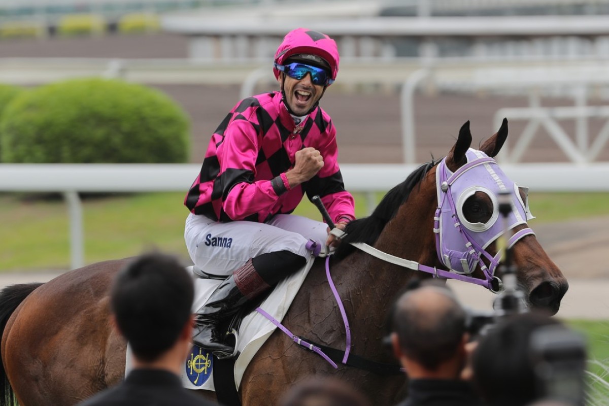 Alberto Sanna celebrates after winning on rank outsider Smart Charade last Sunday at Sha Tin. Photos: Kenneth Chan.