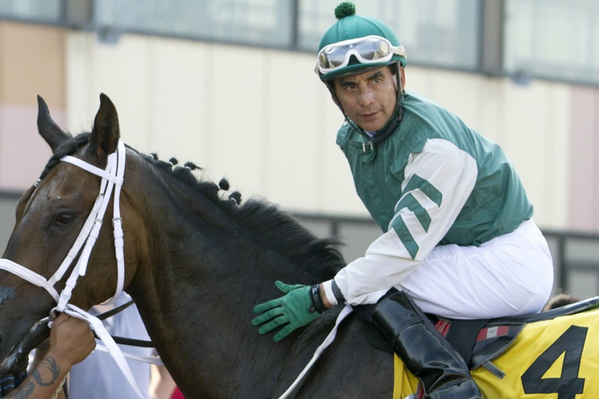 Jose Flores sits atop a race horse at Parx Racing. He was killed when he was thrown from a falling horse and suffered massive head trauma. Photo: AP