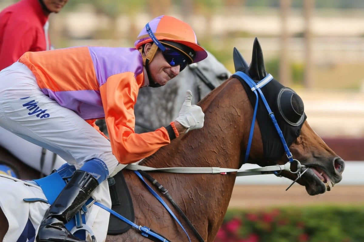 Douglas Whyte gives the thumbs up after winning with Royal Performer. Photos: Kenneth Chan