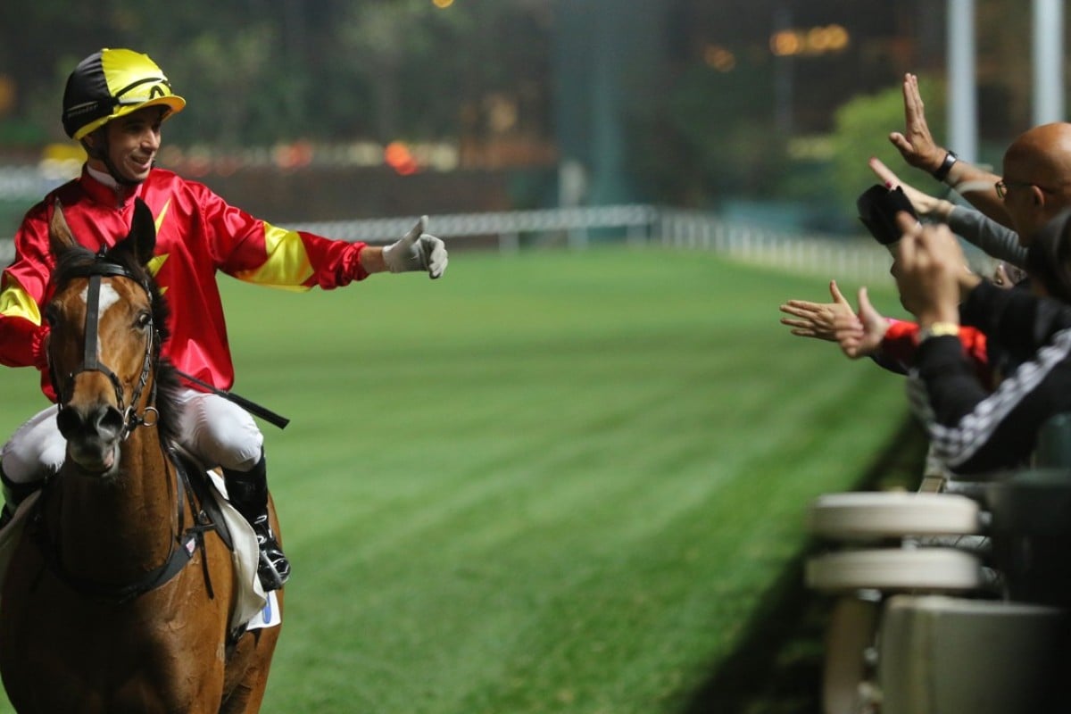 Joao Moreira gives the thumbs up to fans after winning with See Me Now in February. Photos: Kenneth Chan