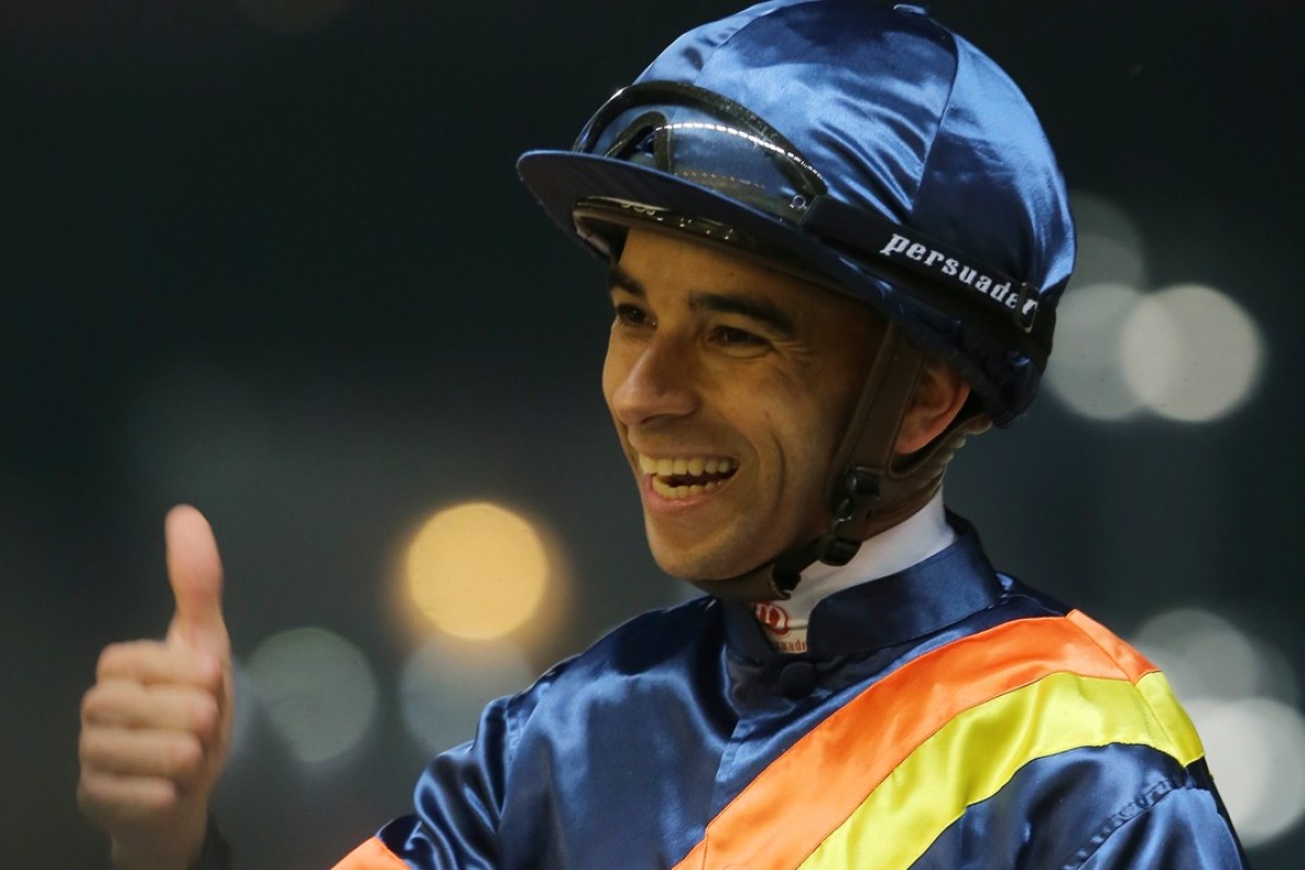 Joao Moreira celebrates a winner. Photo: Kenneth Chan