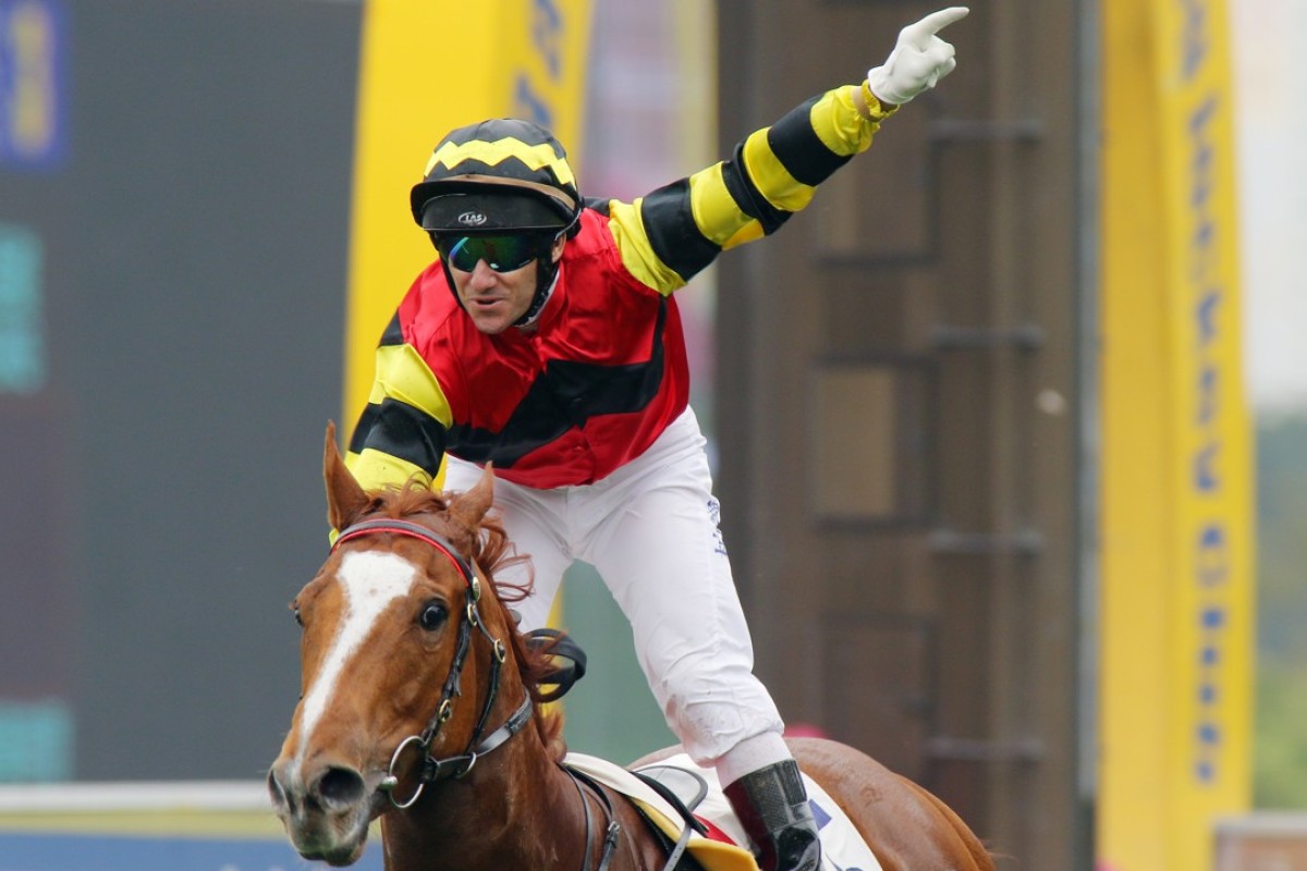 Brett Prebble salutes after a Lucky Bubbles win. Photos: Kenneth Chan