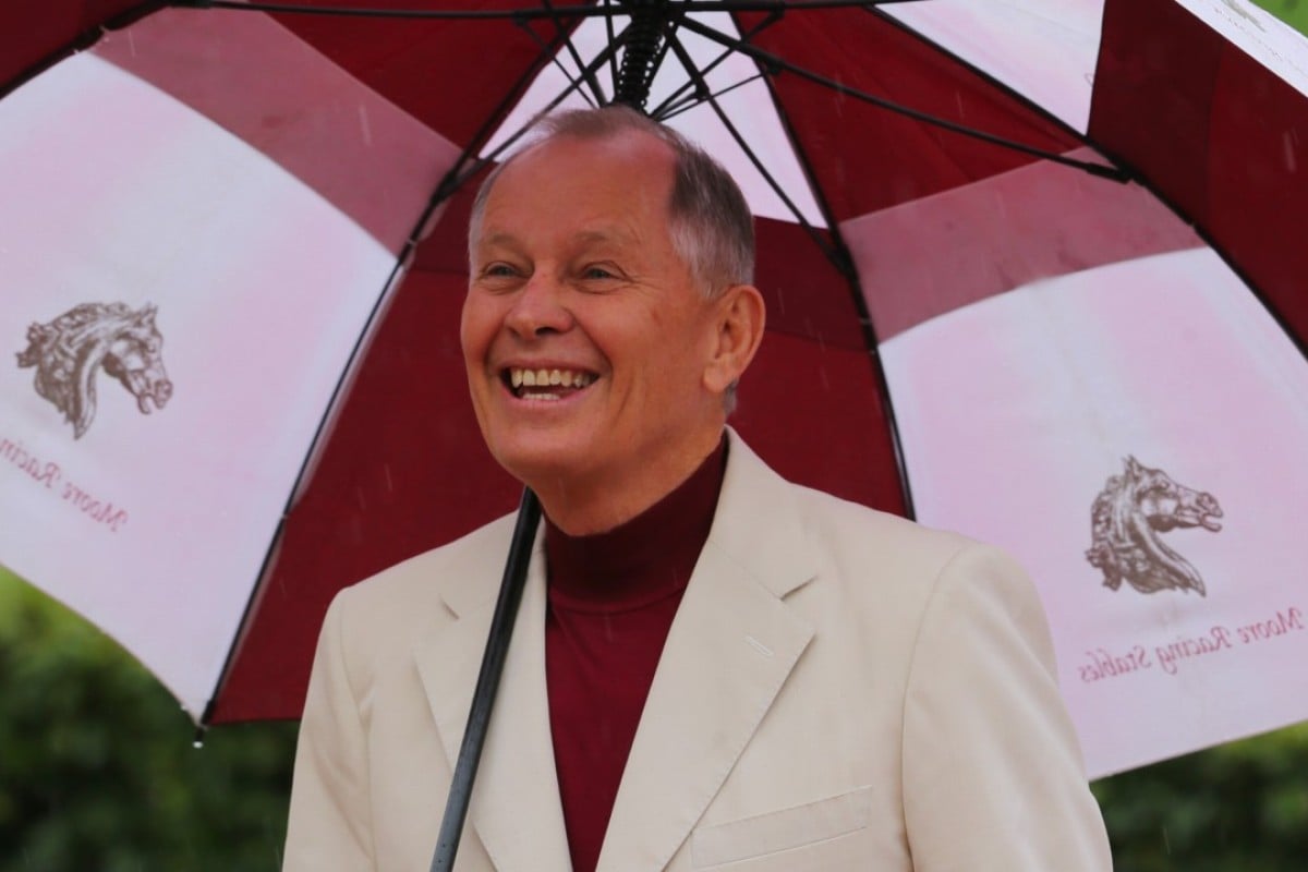 John Moore smiles in the rain. Photos: Kenneth Chan