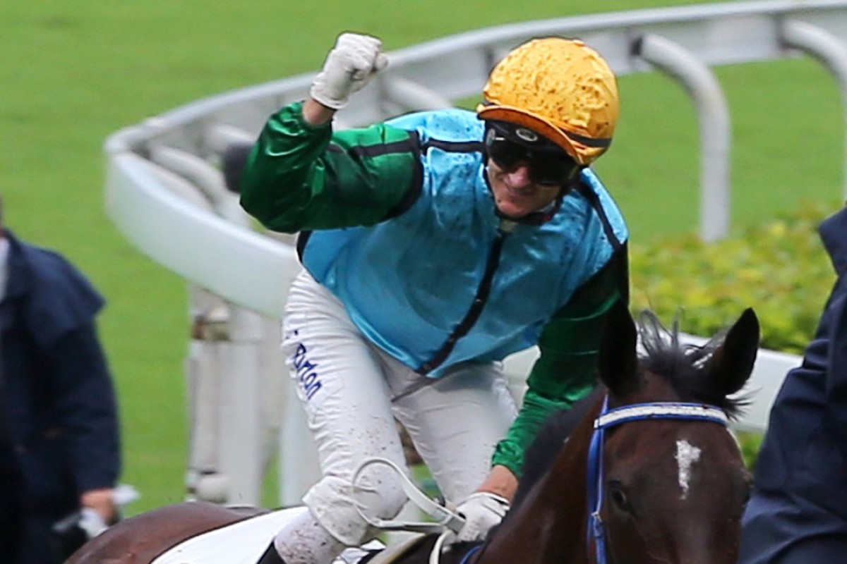 Zac Purton celebrates after clinching the jockeys’ championship. Photos: Kenneth Chan