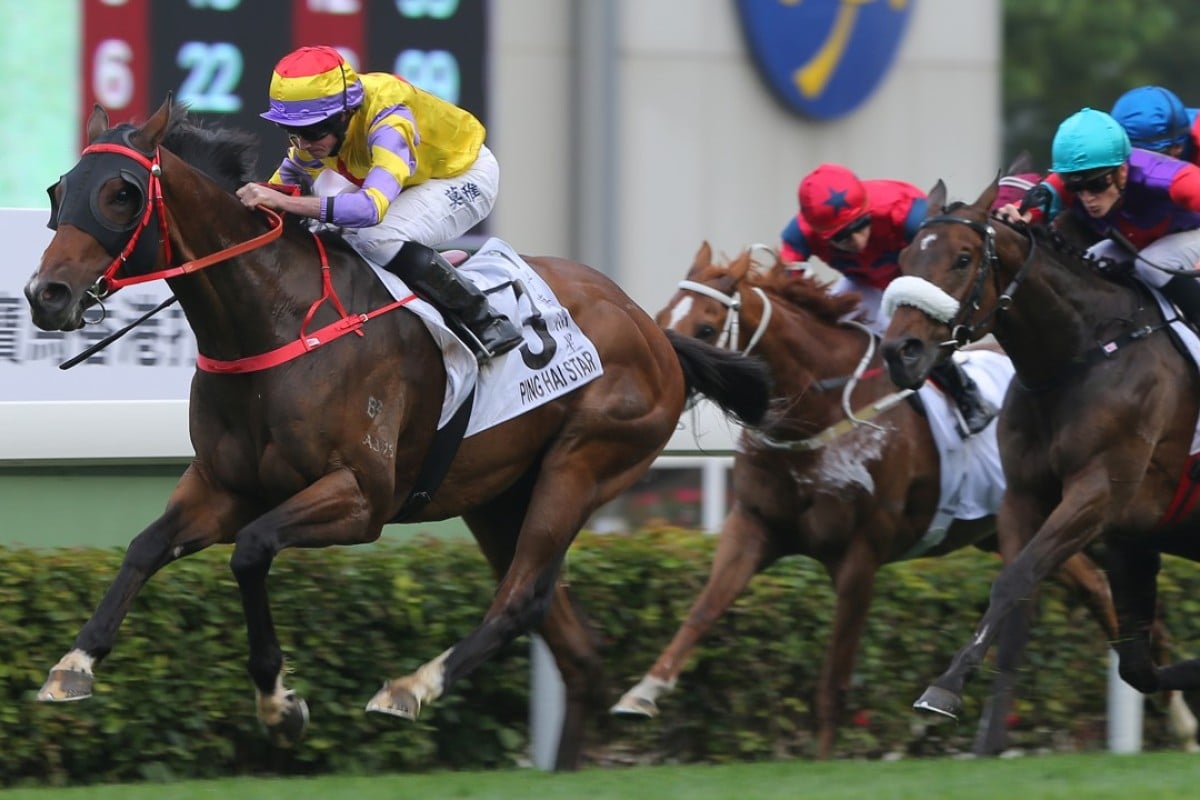 Ryan Moore guides Ping Hai Star to victory in the Hong Kong Derby. Photos: Kenneth Chan