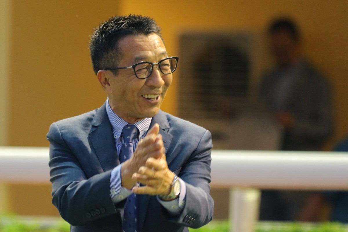 Me Tsui after training a treble at Happy Valley on Sunday during a rare day meeting. Photos: Kenneth Chan