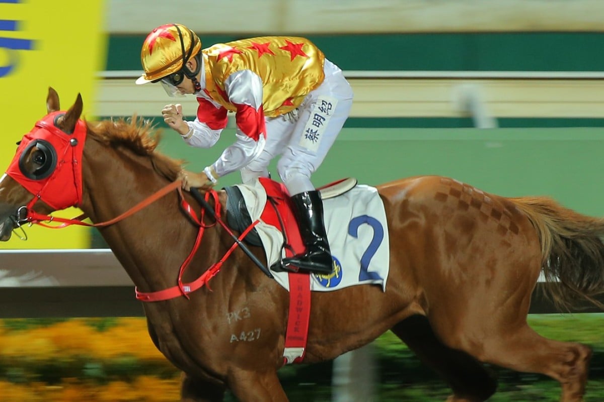 Matthew Chadwick pumps his fist after winning aboard Golden Effort at Sha Tin on Wednesday night. Photos: Kenneth Chan