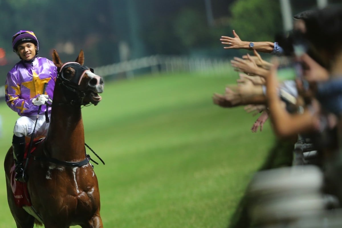 Grant van Niekerk returns to scale after winning with Little Bird on Wednesday night. Photos: Kenneth Chan