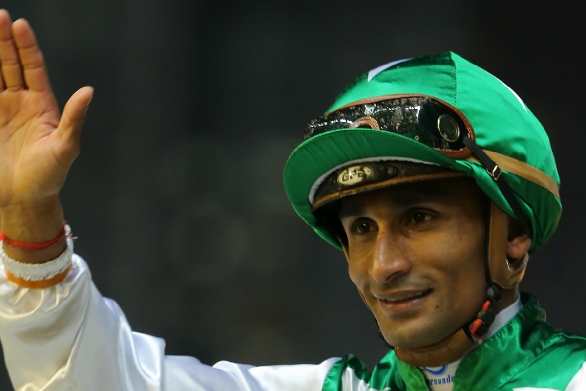 Karis Teetan rides Lim’s Magic in the Singapore Gold Cup on Sunday. Photos: Kenneth Chan