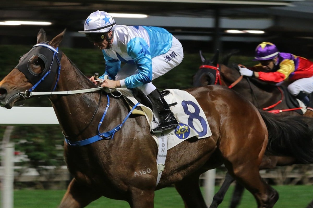 Smart Baby salutes under Zac Purton at Happy Valley on Wednesday night. Photos: Kenneth Chan
