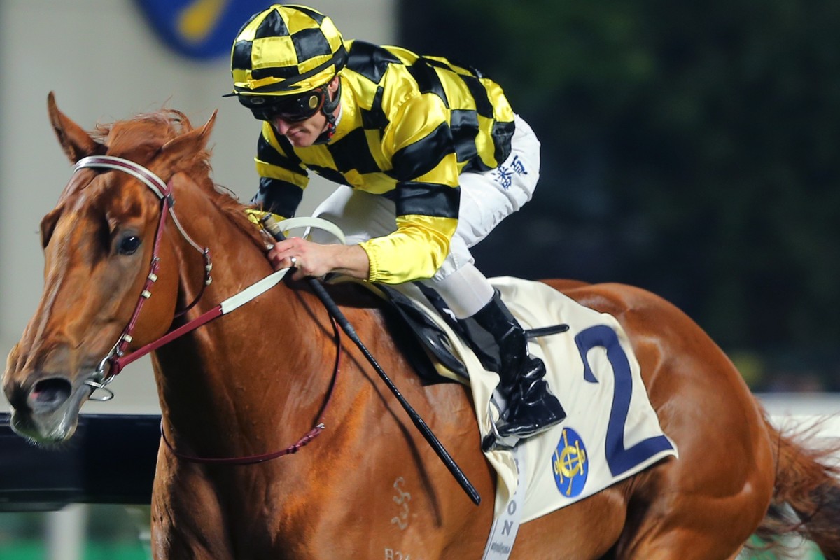 Taking Aim wins under Zac Purton on December 16. Photos: Kenneth Chan