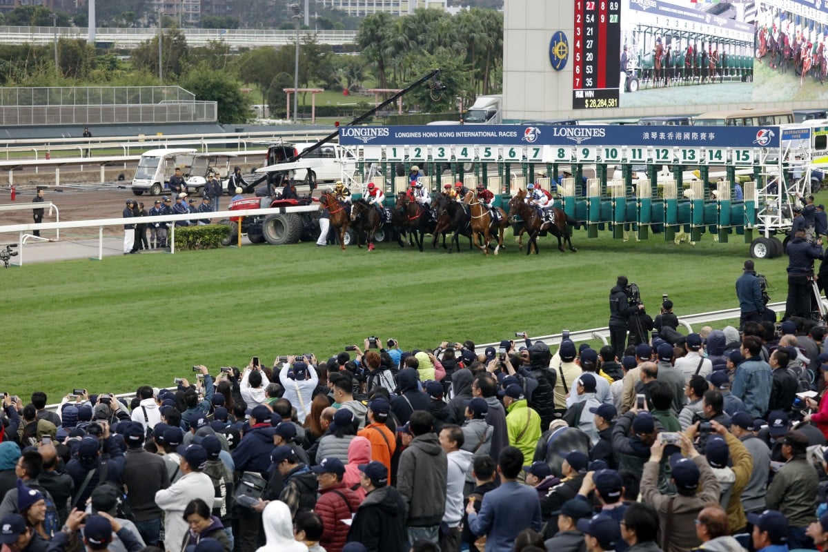 Horses jump from the gates in the 2018 Hong Kong Cup. Photos: Kenneth Chan