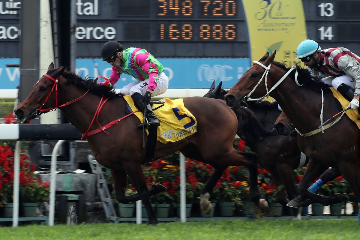 Horse Of Fortune (Silvestre de Sousa) holds off Romantic Touch (Joao Moreira) in the Macau Hong Kong Trophy. Photo: HKJC