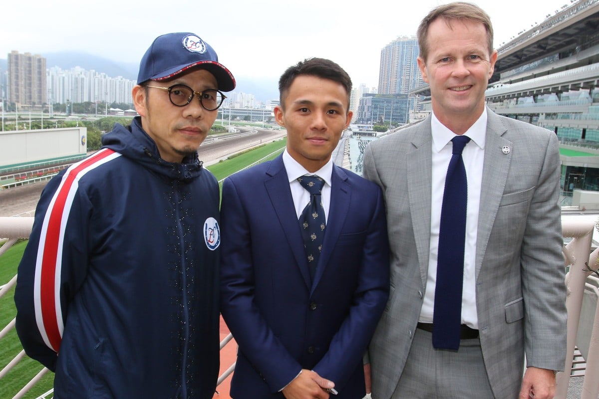 New apprentice jockey Alfred Chan (centre) with his boss Frankie Lor (left) and Jockey Club executive director of racing Andrew Harding at Sha Tin. Photos: Kenneth Chan