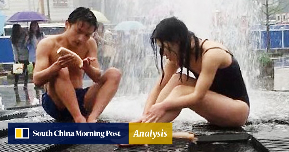 Public Bath Nudist - Young Chinese couple ignore security guards to bathe in ...
