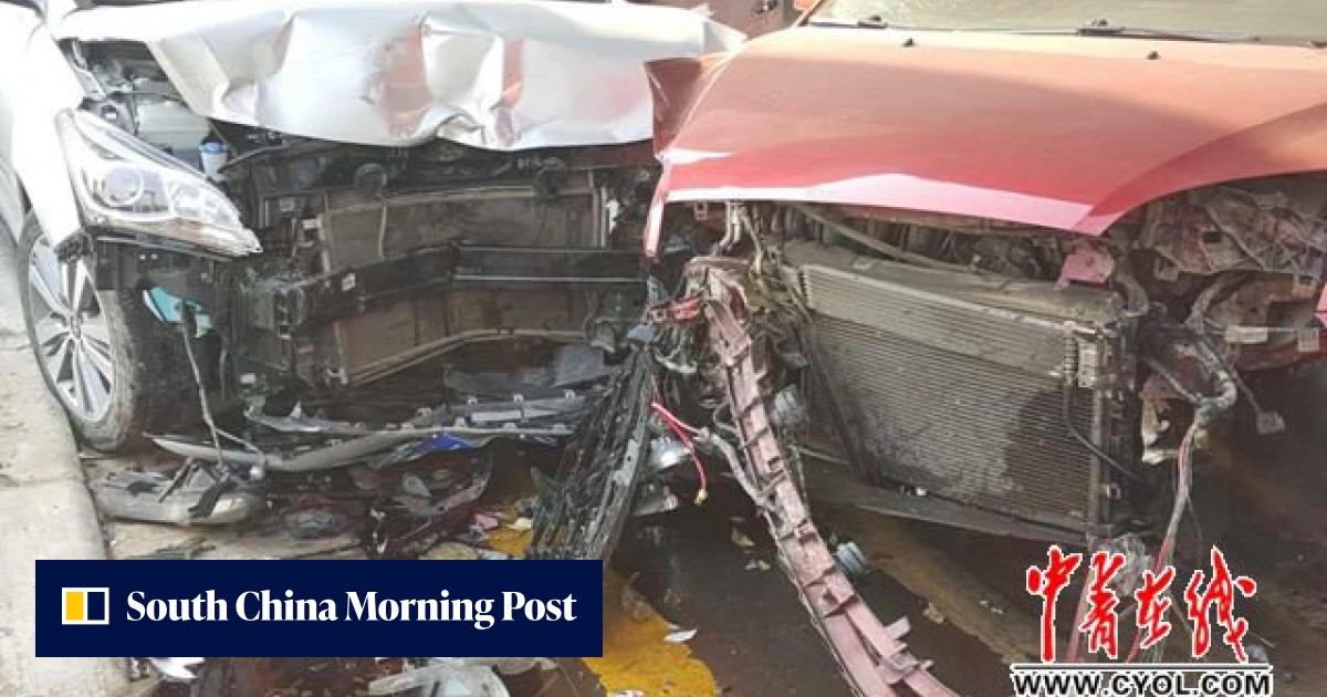 Chinese driver crashes car checking if he's received Lunar New Year ...