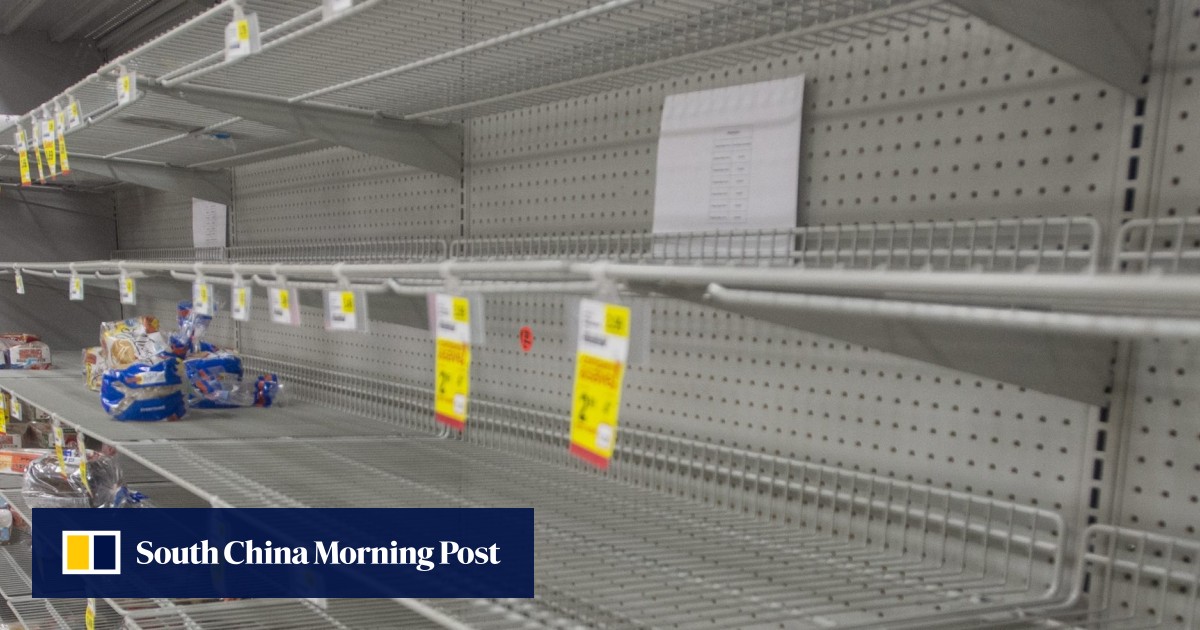 Supermarket shelves stripped bare as millions brace for massive US