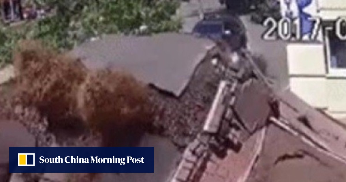 Watch incredible moment water pipe explodes after inflating carpark